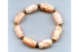 Pink Coral 13x Carved Tube Bracelet