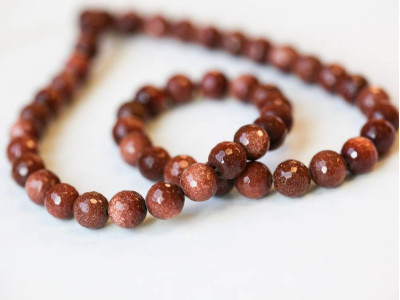 Goldstone 8mm Faceted Round