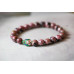 194-1257 Rhodonite <br>8mm Round Bracelet