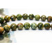 195-1011 Rhyolite <br>12mm Faceted Round