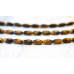 210-1192 Tiger Eye <br>6x12 Faceted Oval Rice